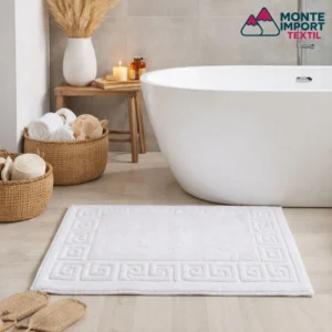 Alfombrín de baño Greca blanco de 650 g en rizo 100% algodón de Monte Import Textil